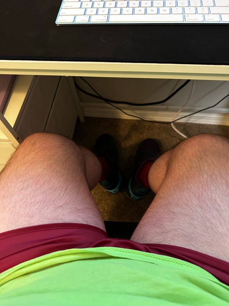 My legs as seen from my POV sitting at a desk