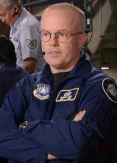 Gary Jones as Walter from Stargate cross armed in uniform 