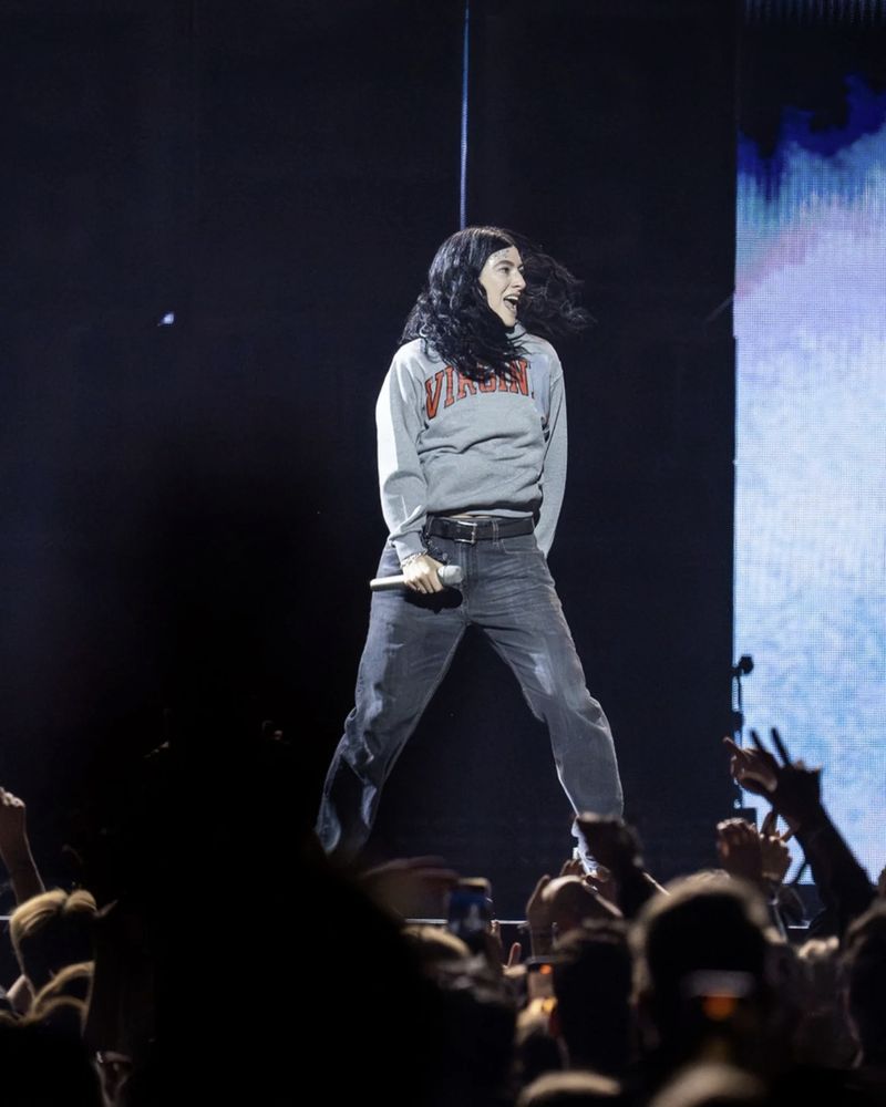 Lorde in Seattle. Grey "Virginia" hoodie turned into "Virgin" with tape. Dark jeans. Ultrasound World Tour.