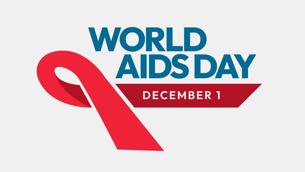 Logo saying "World Aids Day December 1", with a red ribbon decoration. 