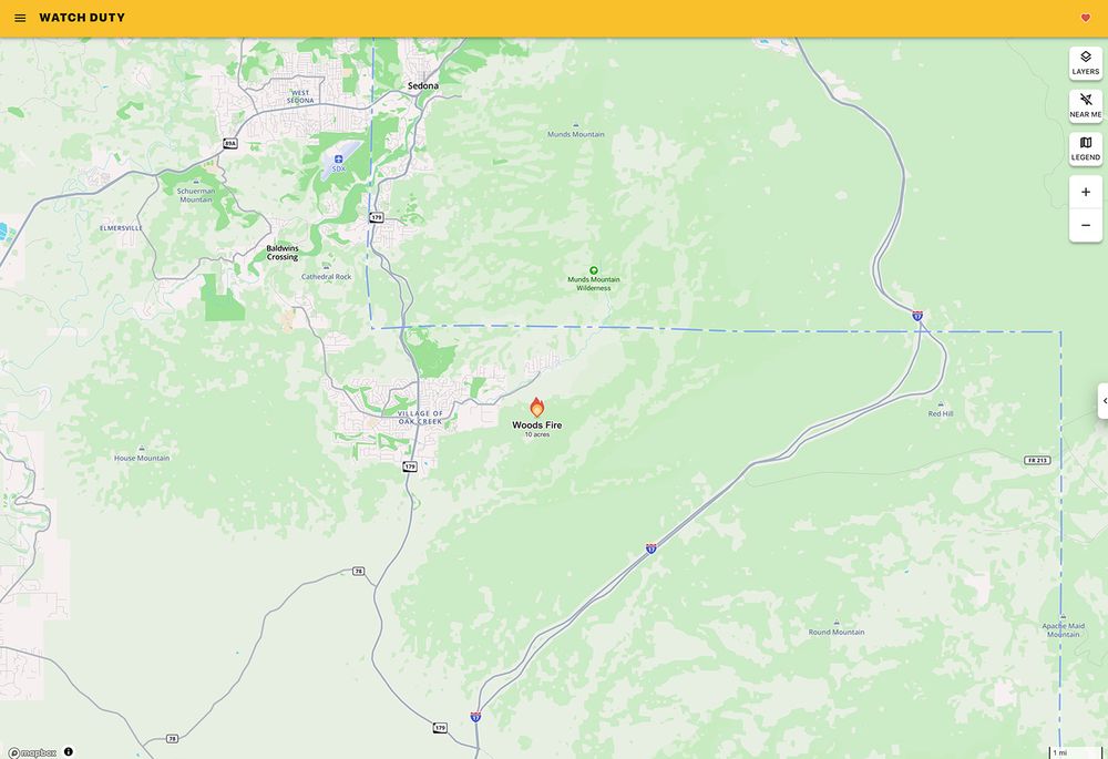 Watch Duty app showing the location of the Woods Fire near Village of Oak Creek, Arizona.