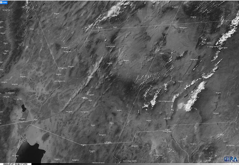 GOES-19 visible satellite image showing the bands of cirrus clouds aligned NNE-SSW over Arizona this morning (27 July 2025).