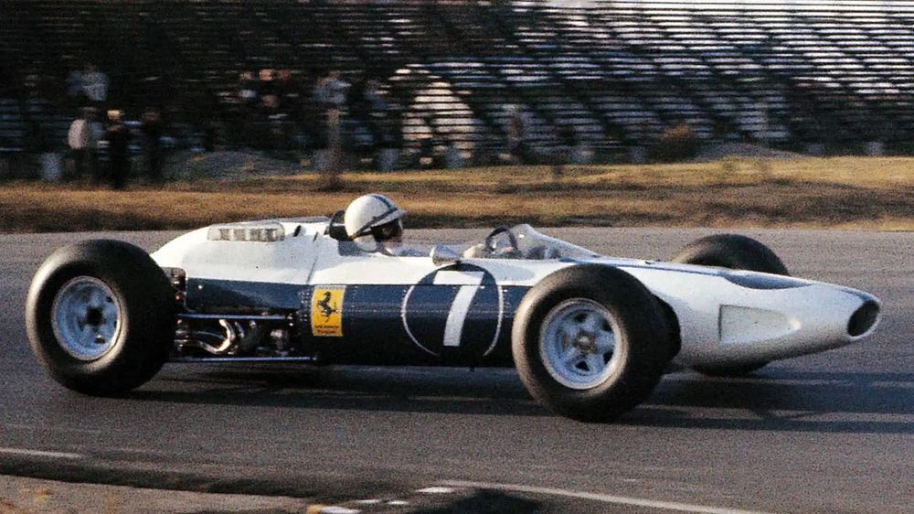 John Surtees at Watkins Glen in his iconic white and blue Ferrari 158