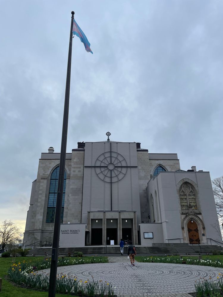 A Trans Pride flag flying in front of St. Mark’s Episcopal Cathedral, Seattle.