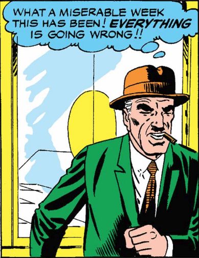 J Jonah Jameson walking through the doors to the Daily Bugle offices, wearing a fedora, green suit and smoking a cigar