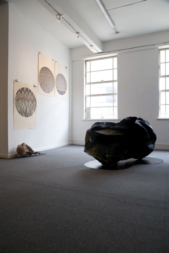 A partial view of the Salon #2 installation, with several wall- and floor-based artworks by Victoria Lucas, Rachel Smith and Emma Bolland in the foreground and background.