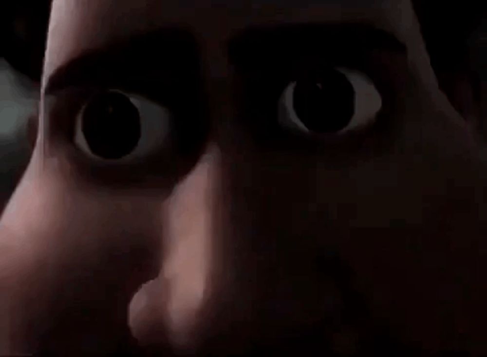 a close up of a person 's eyes in a dark room in a cartoon .