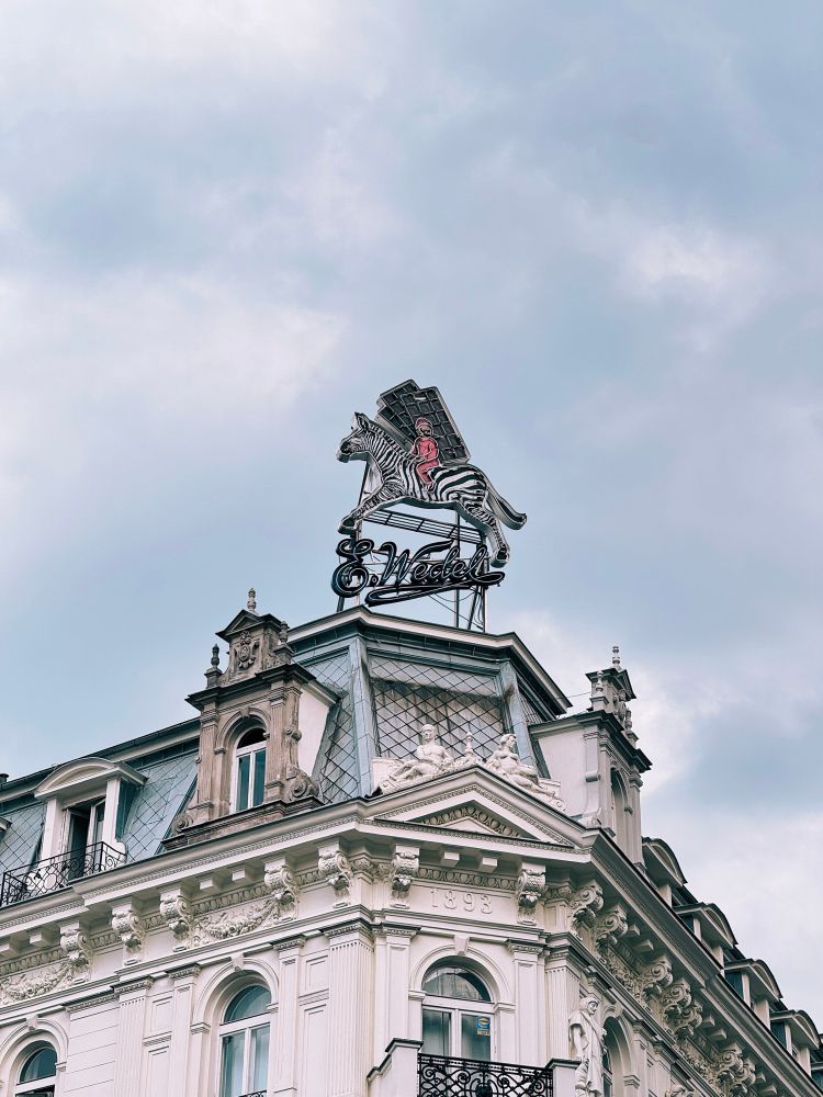 Photograph: ornate building with vintage chocolate company logo - E.Wedel 