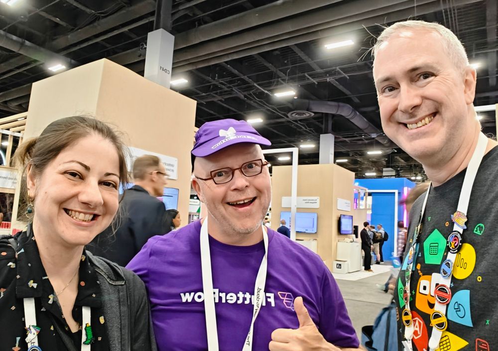 Michael, Puf, and Martine in the exhibitor hall at Google Next 2025
