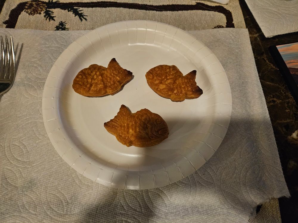 Three mini Taiyaki on a plate