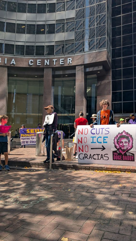 Action outside Valor Equity Partners' Columbia Tower office in Seattle. Community and labor allies protesting Antonio Gracias and Valor's role in DOGE, deportations and the surveillance state