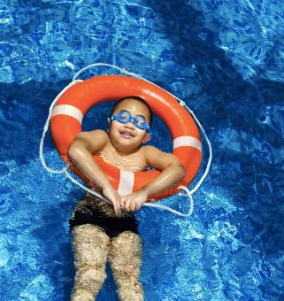 Image of person in water in life preserver ring 