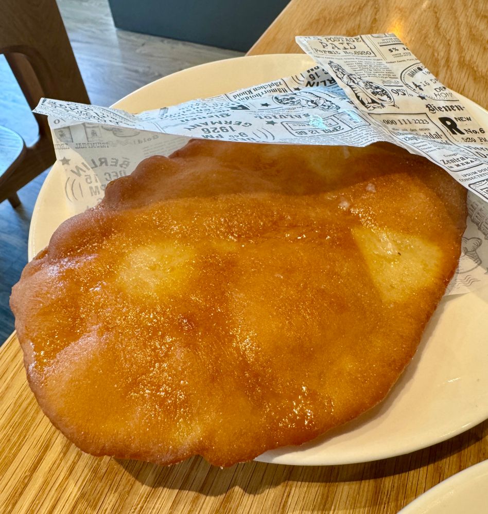 Beaver tail fried dough pastry with sugar and lemon