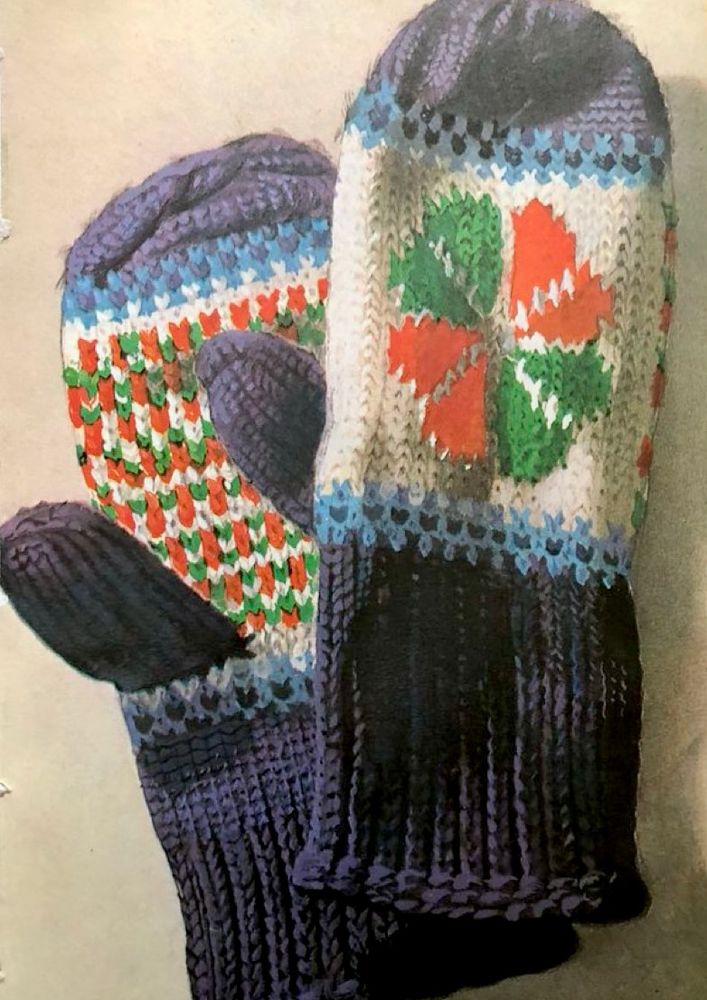 A photo-realistic illustration of a colourful pair of hand-knitted children’s mittens