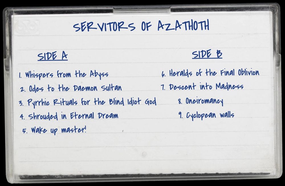 A cassette tape by a fictional band called "Servitors of Azathoth"
