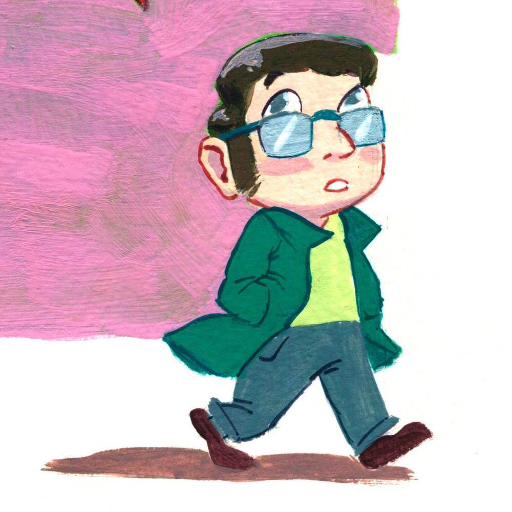 zoom on the man, in his 30s, wearing glasses and a green coat and shirt.