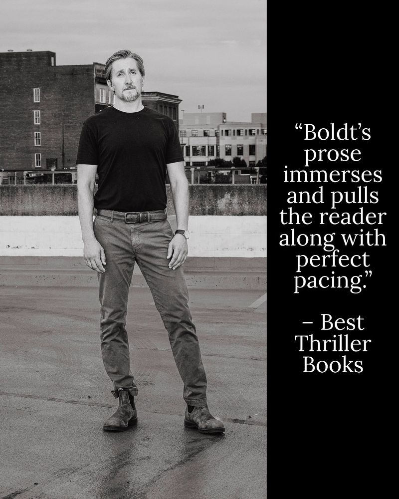 Author photo of Josh Boldt standing on a rooftop parking lot in Lexington, KY. Quote says: “Boldt’s prose immerses and pulls the reader along with perfect pacing.” – Best Thriller Books