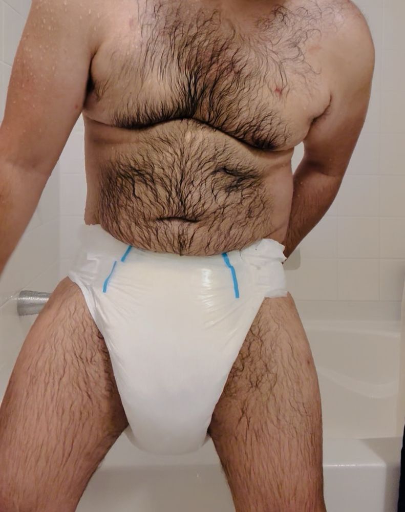 Me standing in my bathroom in absolutely SOAKED white diaper after showering with it on 