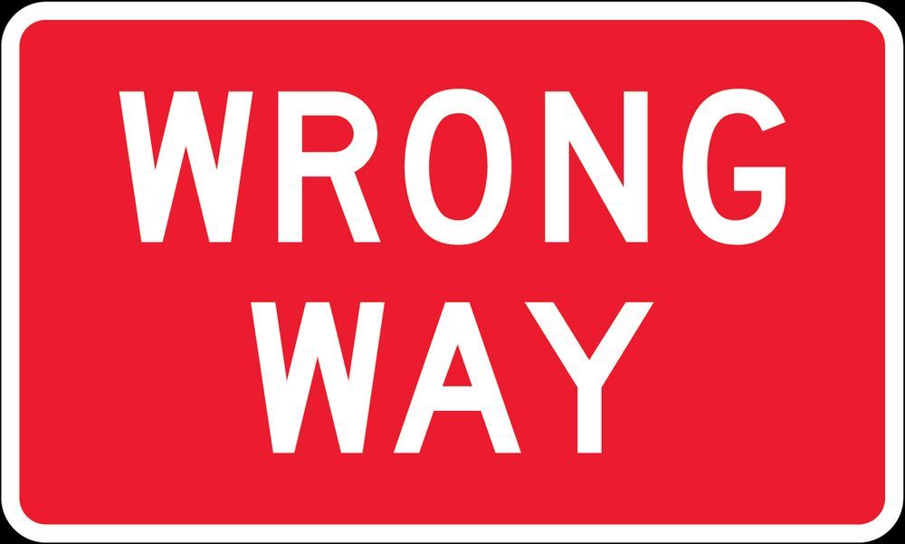 Red sign, which says in large letters: WRONG WAY.