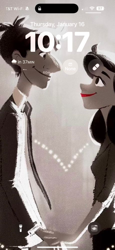 My phone lock screen of a man and woman looking at each other
