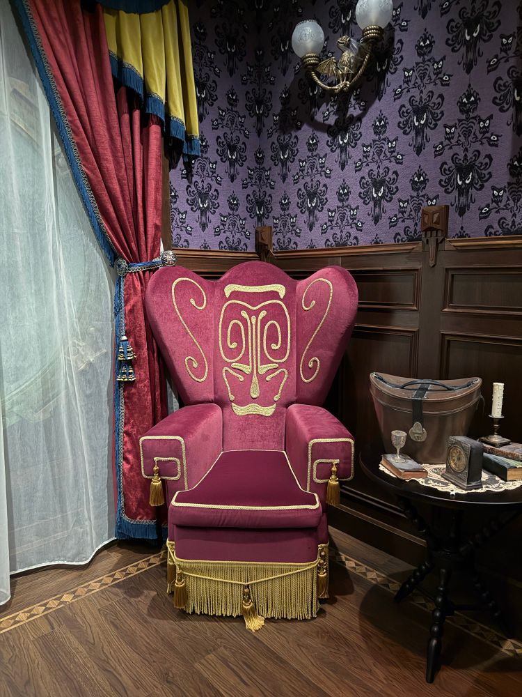 Red chair with Donald Duck face from Haunted Mansion 