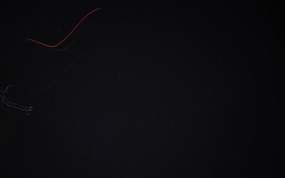 a picture of the night sky. there are some streaks of light on the end where i messed up the picture lol but they kind of look cool