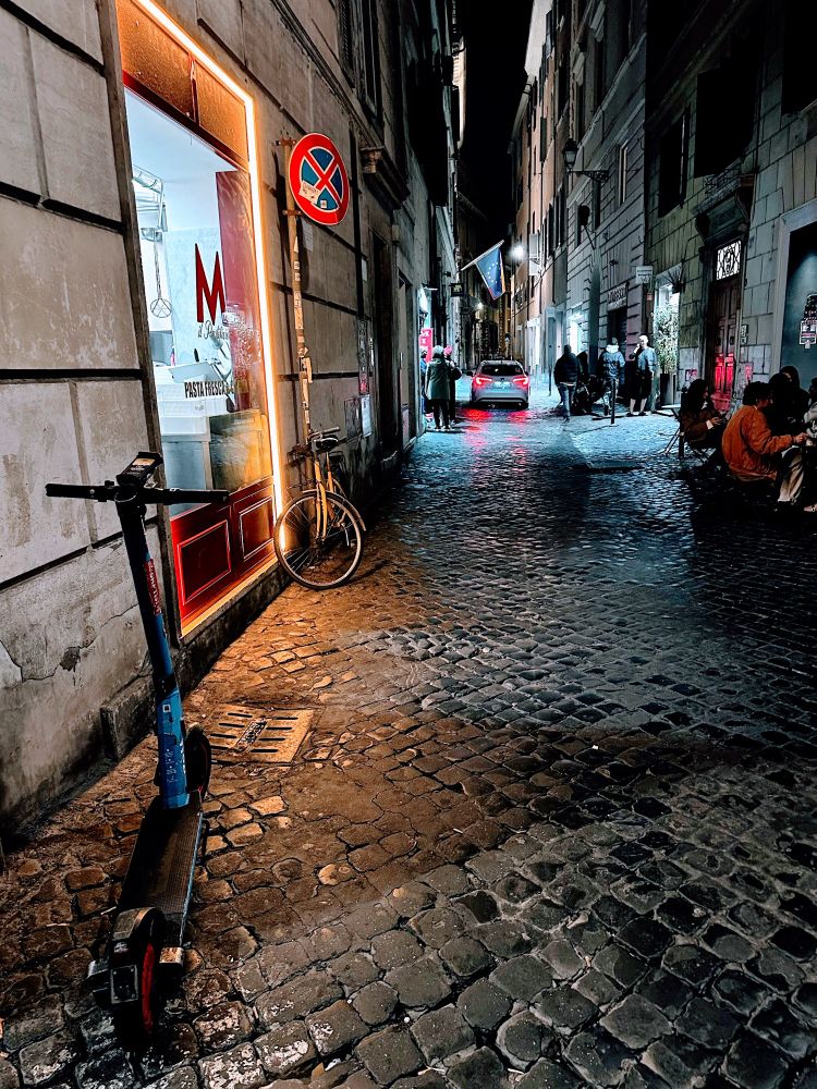 Rome street scene at night.