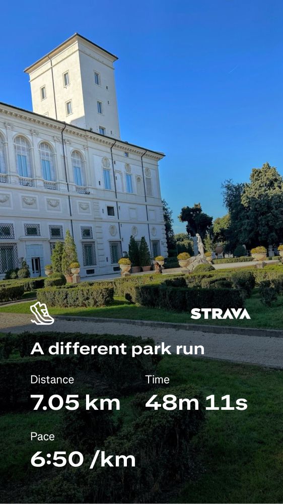 Strava running stats against a photo of the Borghese Gallery and gardens.