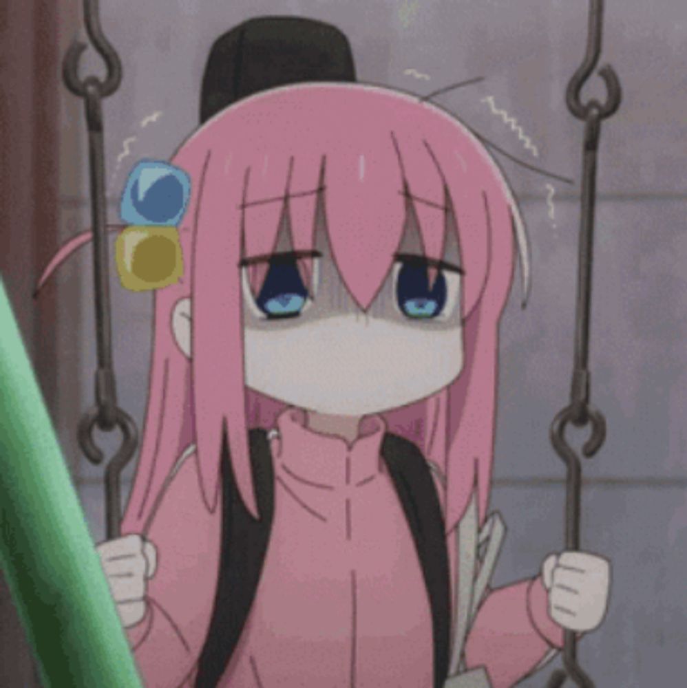 a girl with pink hair is sitting on a swing with a sad look on her face