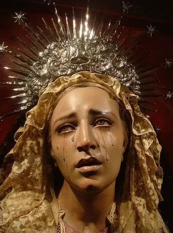header image - a statue of a woman with tears coming from her eyes