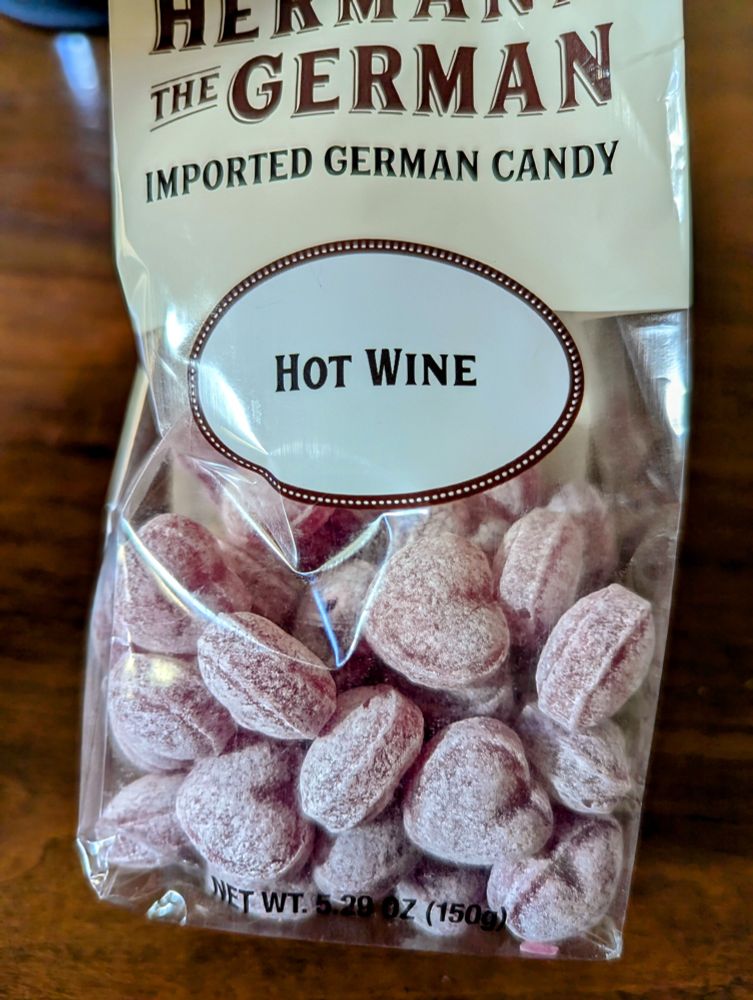 Hermann the German imported German candy in Hot Wine flavor, shaped like little hard candy hearts dusted in powdered sugar 