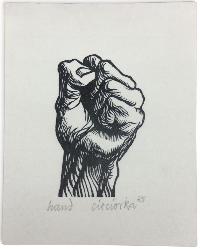 Print of a muscular upraised fist, signed “cieciorka 65”
