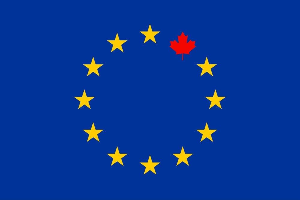 A modified version of the European Union (EU) flag. Instead of the usual circle of twelve yellow stars on a blue background, one star at the top has been replaced with a red maple leaf, symbolizing Canada. The design suggests a closer relationship between Canada and the EU.