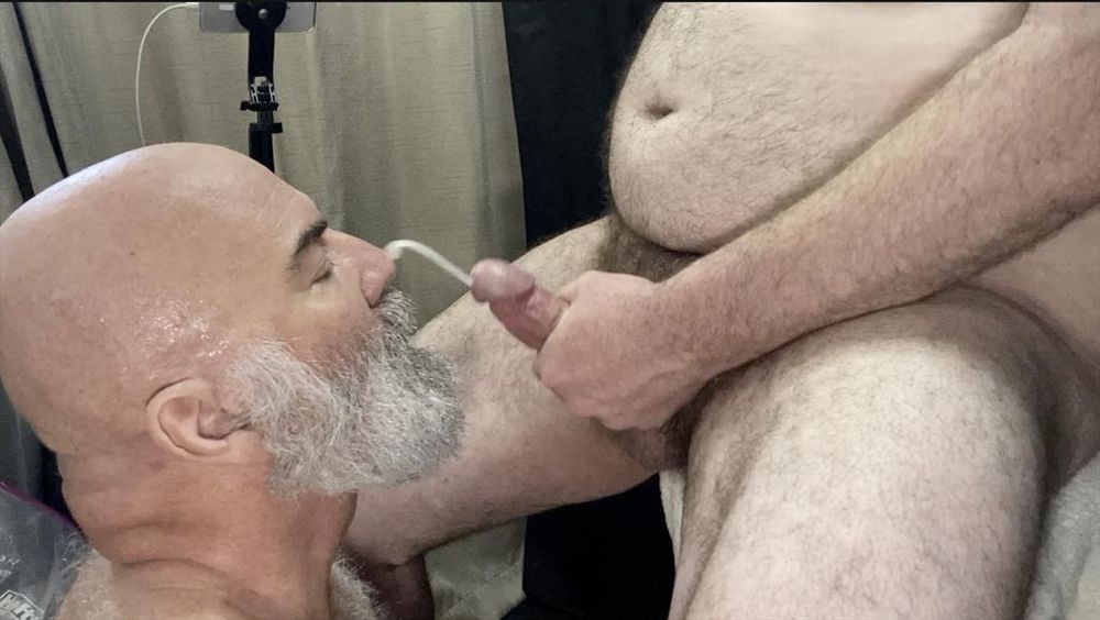 Daddy bear shots big rope of cum on my beard as I suck his cock