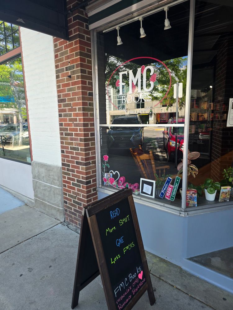 The front window of FMC Books, a romance book store in Missoula, Montana. 