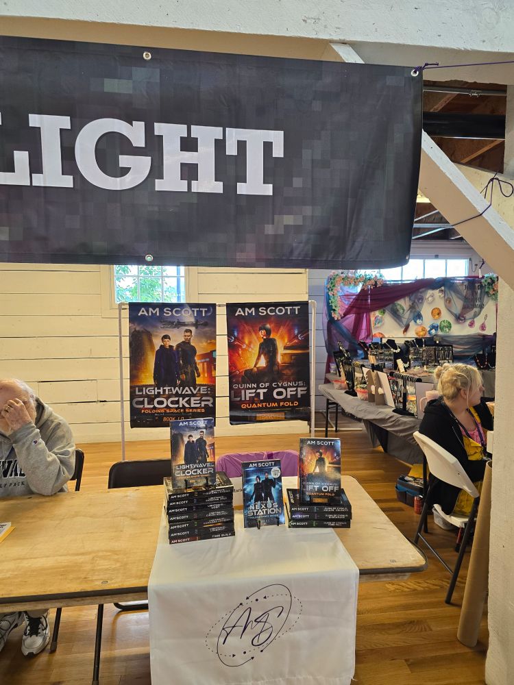 AM Scott books at the Spotlight table.