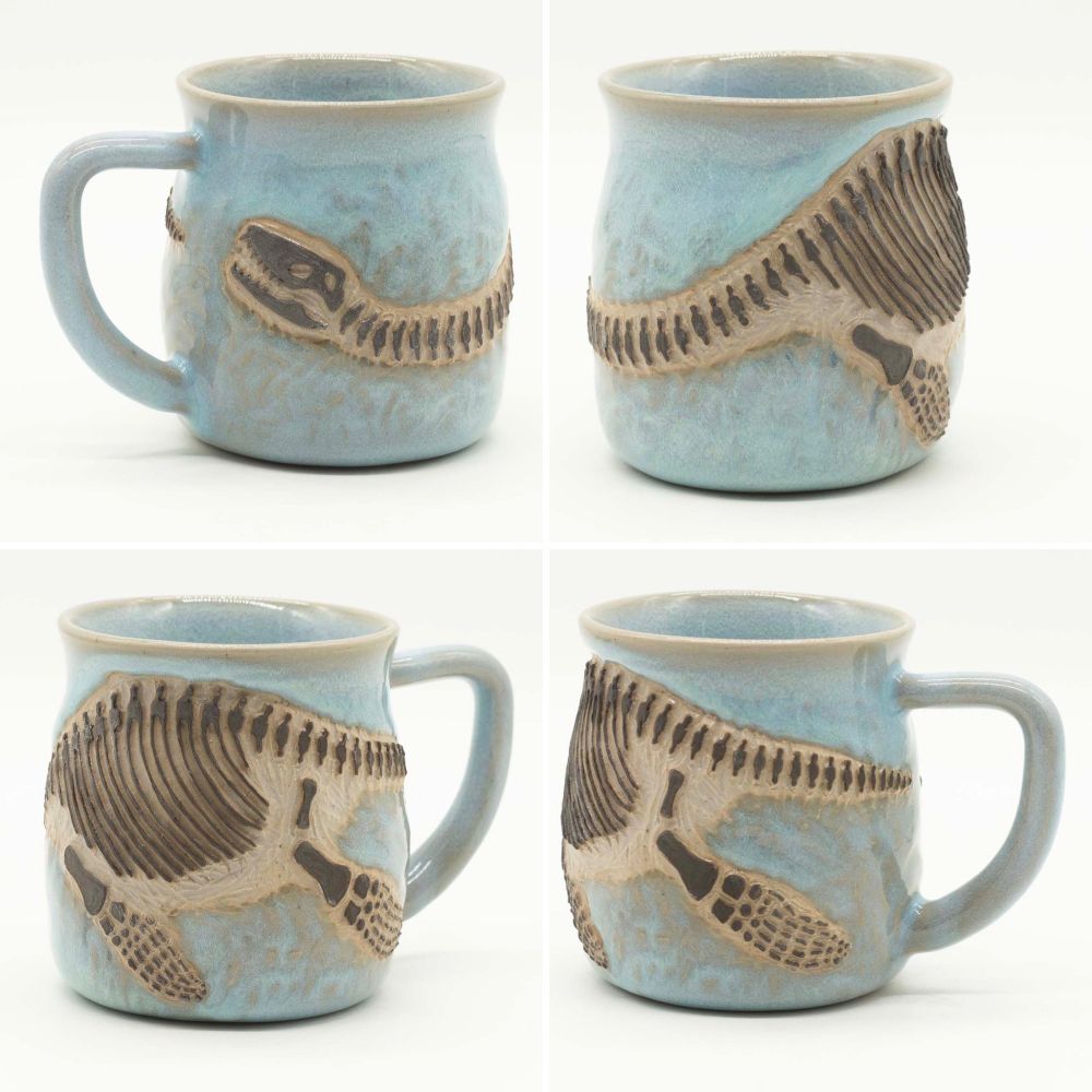 Ceramic mug decorated with fossil of a plesiosaur