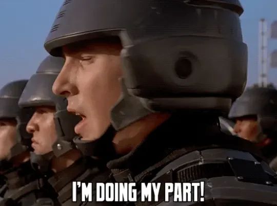 Frame from film 'Starship Troopers'
Soldier in a line with others saying "I'm doing my part!"