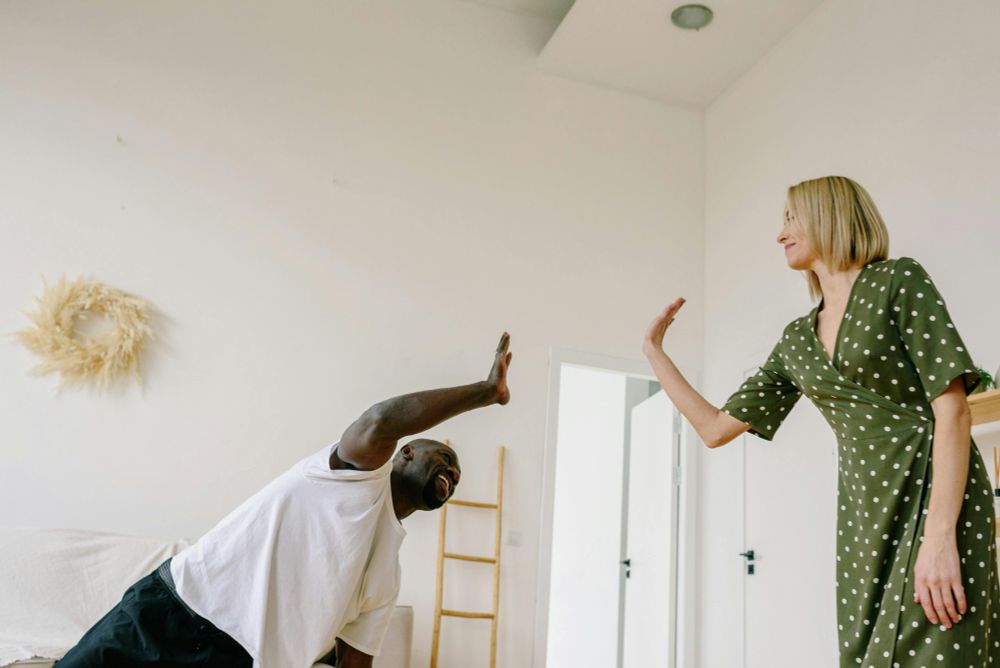 Two people high-fiving