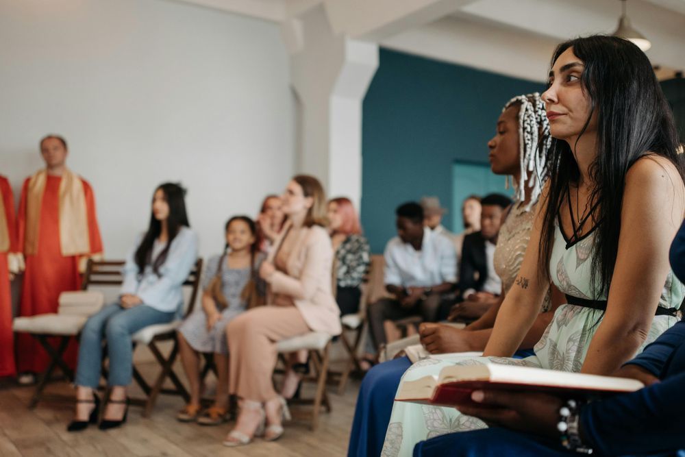 Group of people listening to mass.