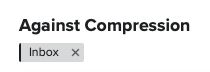Screenshot of part of an email inbox with a subject line that says "Against Compression" and an Inbox label