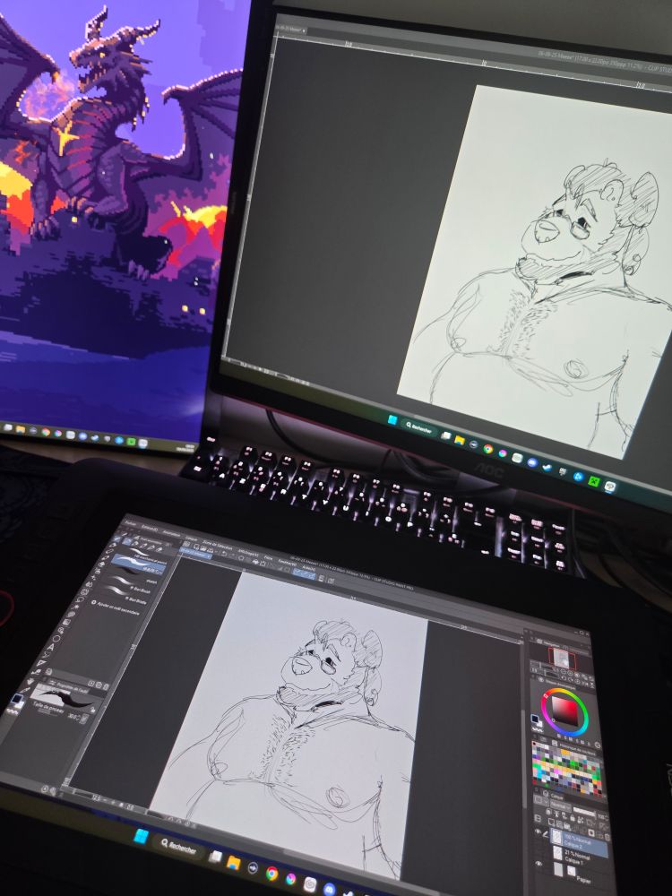 Picture of my setup with a sketch of my bear on my tablet and one of my monitors