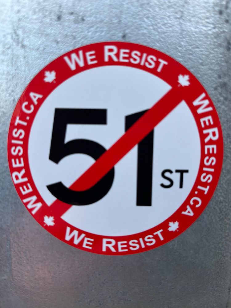 Sticker showing crossed out 51st. On the borders it read “We Resist” and we see the URL https://weresist.ca/
