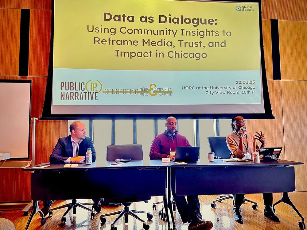 NORC's Ashani Johnson-Turbes and Vince Welch  sit at a table with a third panelist during a discussion titled "Data as Dialogue: Using Community Insights to Reframe Impact in Chicago" at the 2025 Connecting Media & Community Conference: Reframing Purpose, Possibility, and Partnerships, hosted by Public Narrative.