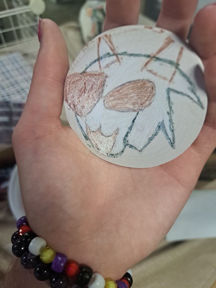 A sticker of my drawing of davepetasprite from Homestuck