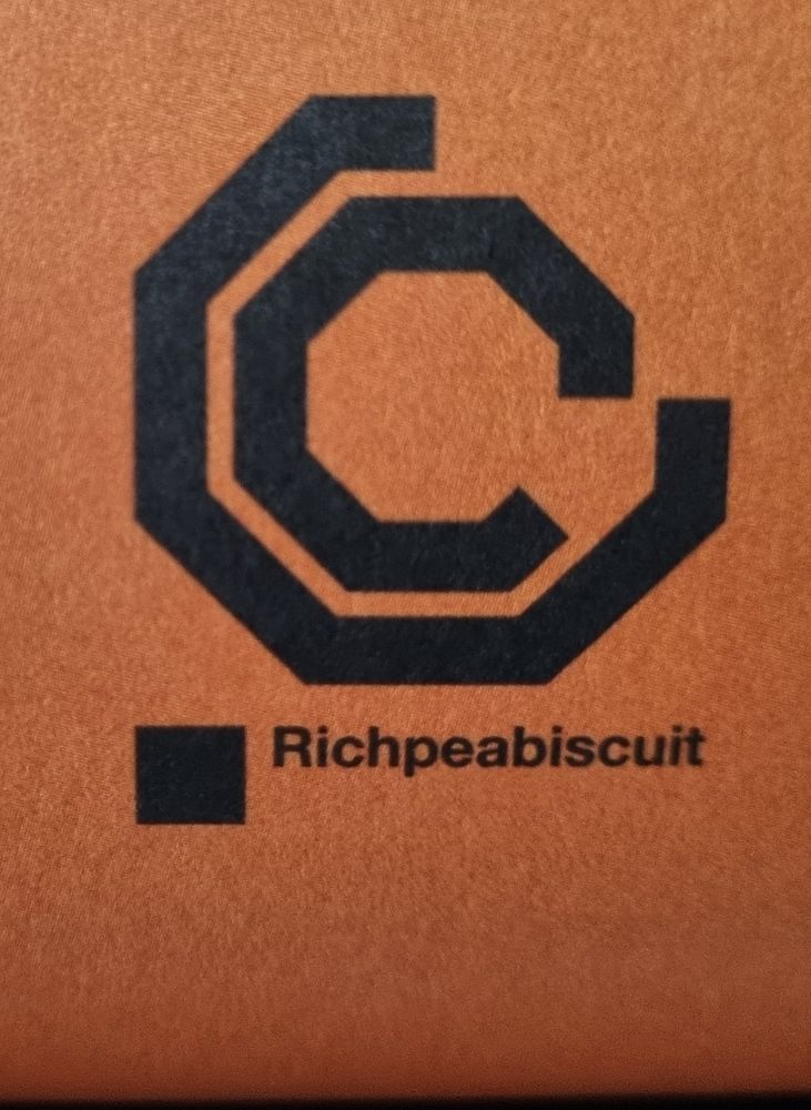 Close up of "Richpeabiscuit" and a hexagonal shaped symbol above. Benefactor woop woop.