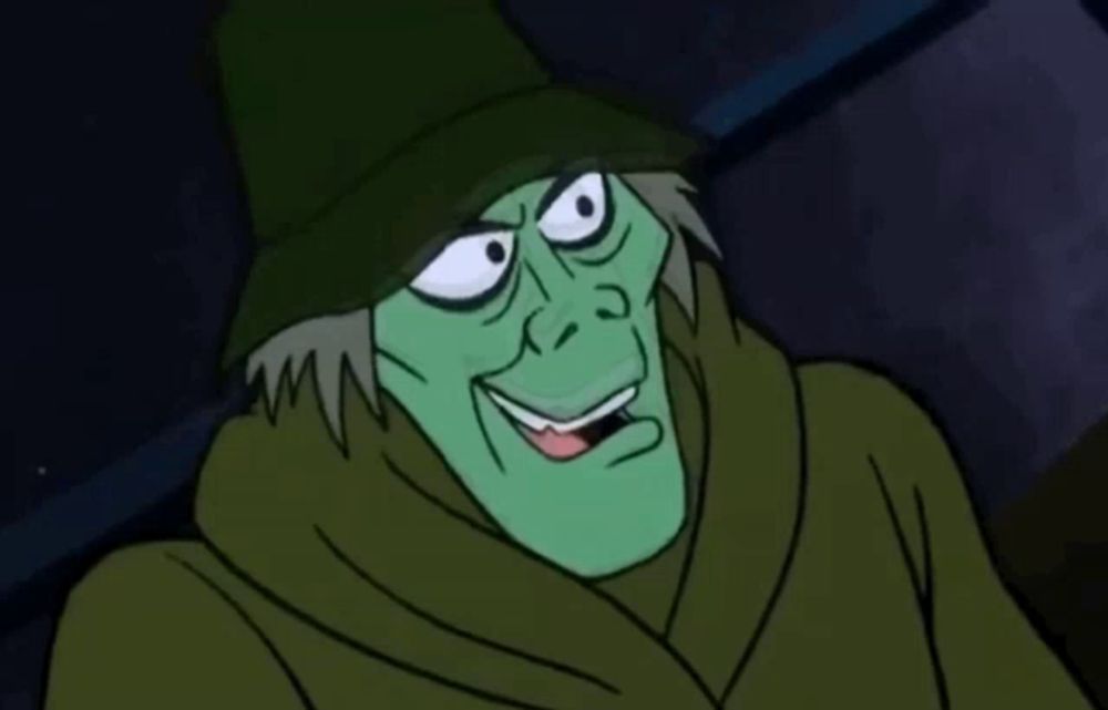 a cartoon character with a green hat and a scarf