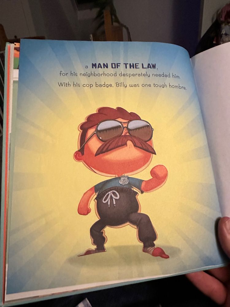 Cartoon of baby with a mustache, sunglasses and a police badge with the caption, “a MAN OF THE LAW for his neighborhood desperately needed him. With his cop badge, Billy was one tough hombre.”