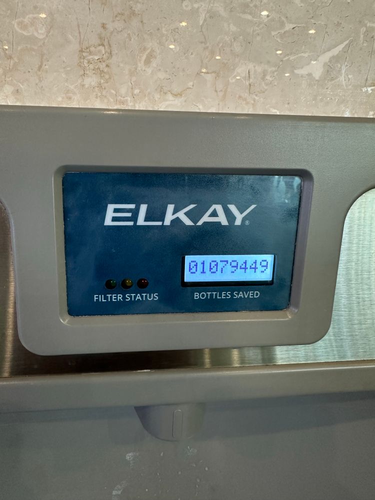 Elkay water fountain with bottle filler reading “1079449 Bottles Saved”