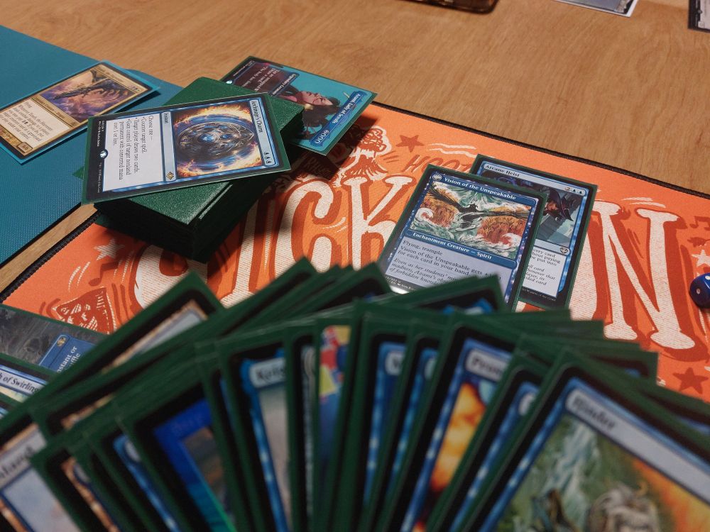 Vision of the Unspeakable on the field with Arcane Heist encoded on it. 
23 cards in hand. 
Azami in the command zone. 
Archmage's Charm on top of library.